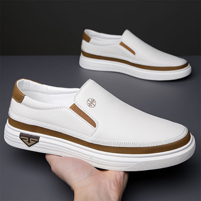 Pair of Giacomo Comfort Shoes in white with brown contrast stripe, lightweight casual footwear by Polumi.