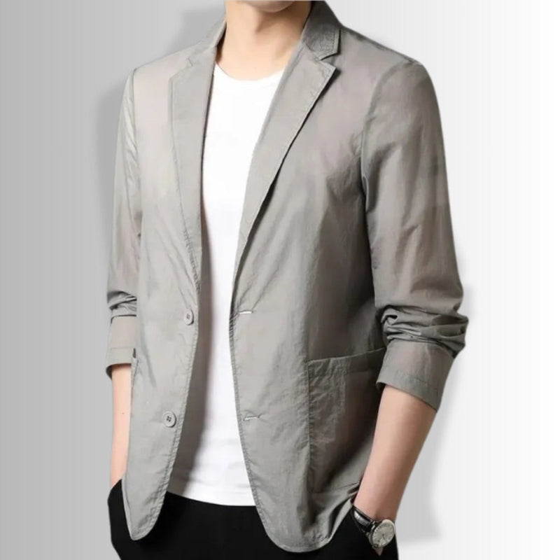 Side view of Valerio Cascade Blazer in gray featuring casual elegant fit.
