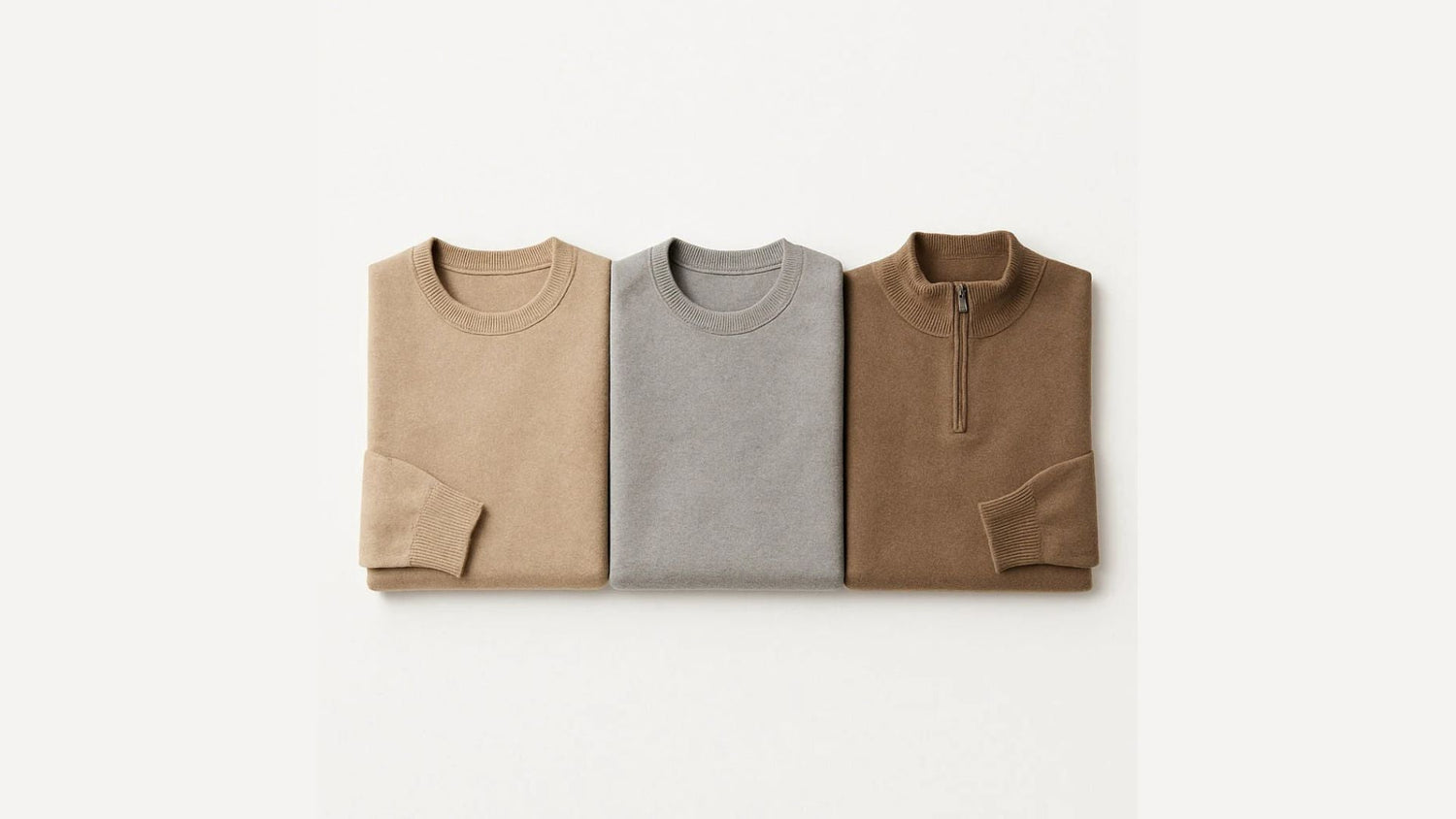 Polumi men’s sweaters — beige, grey, and brown knitwear with zip-collar and crewneck styles, folded flat on neutral background.