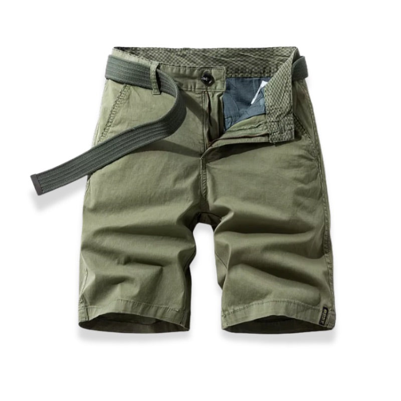 Green shorts with a belt on a white background