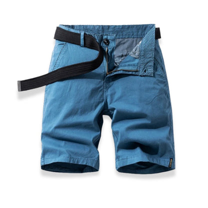 Blue shorts with a black belt on a white background