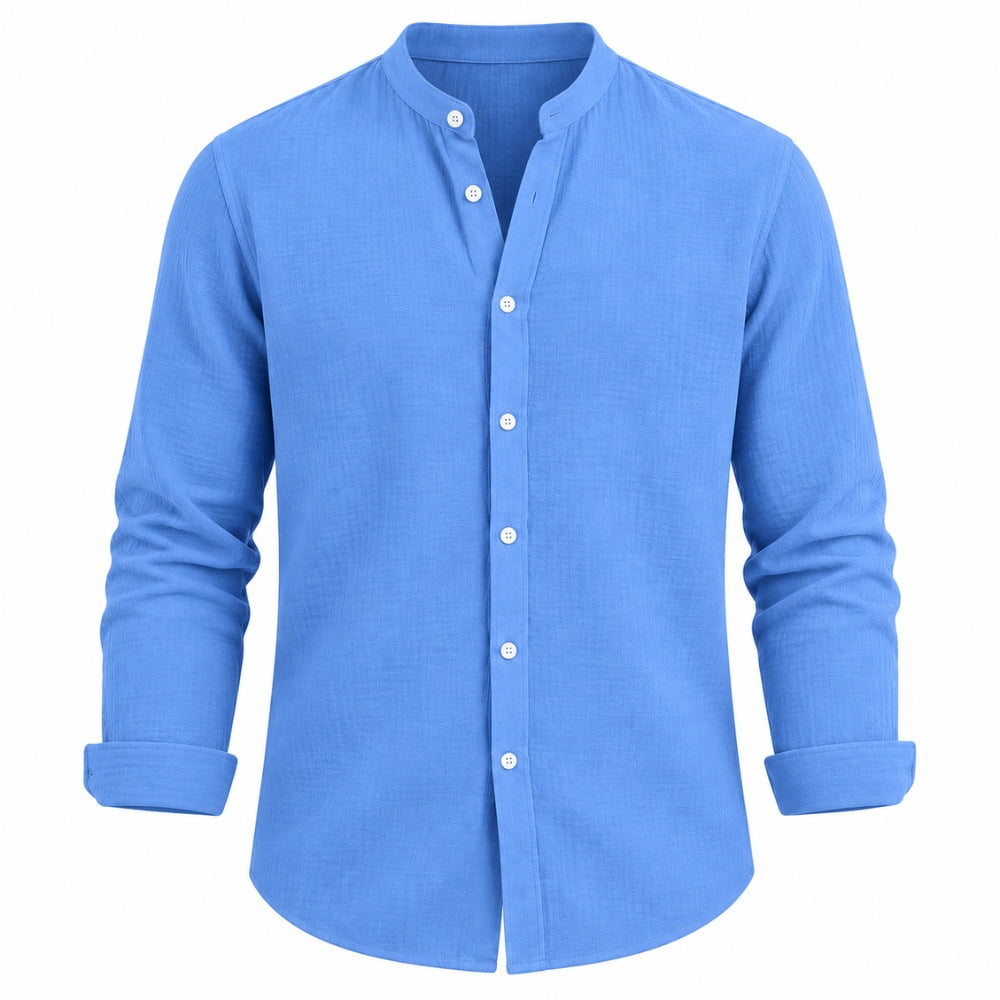 A men's long-sleeve button-up shirt in a solid medium blue color, featuring a mandarin collar and white buttons, shown on a plain white background.