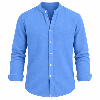 A men's long-sleeve button-up shirt in a solid medium blue color, featuring a mandarin collar and white buttons, shown on a plain white background.