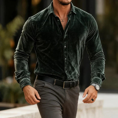 Man wearing a dark green velvet shirt 