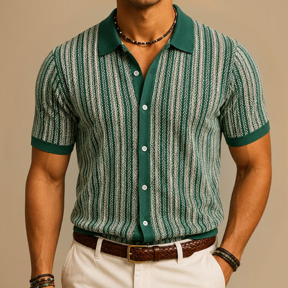 Man wearing a green and white striped shirt with a beige background
