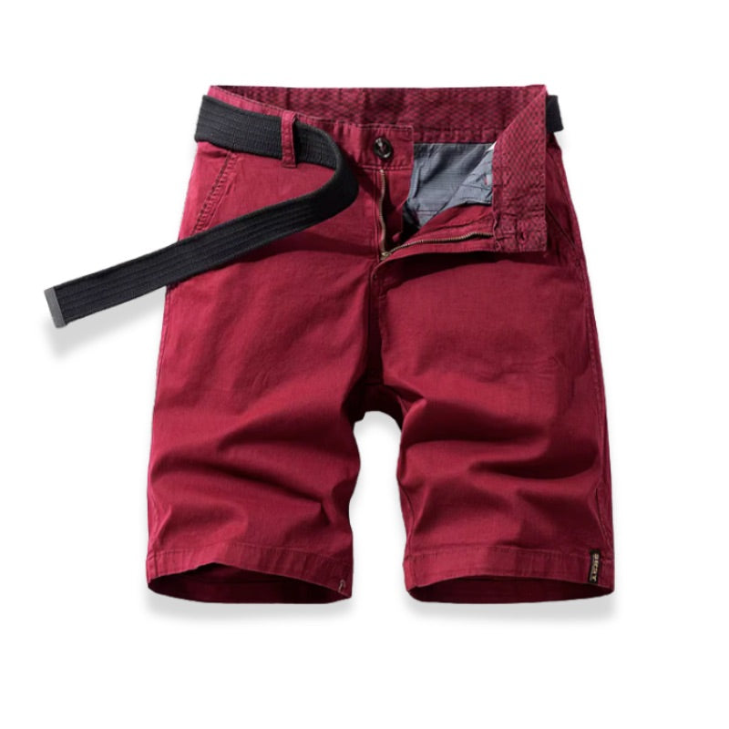 Red shorts with a black belt on a white background