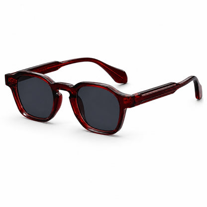 Sunglasses with red frame and dark lenses on a white background