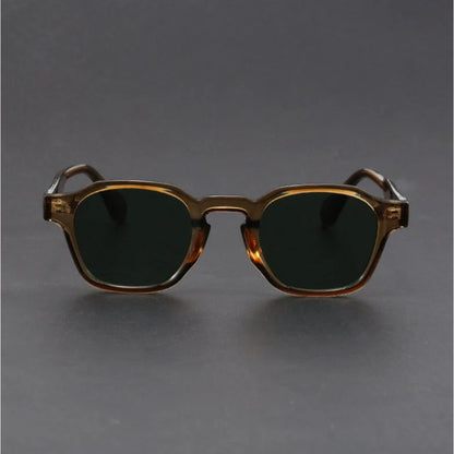 Sunglasses with a tortoiseshell frame on a gray background