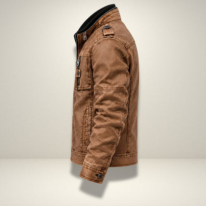 A brown washed canvas utility jacket with a black collar, shown in a side profile view against a light beige studio background.