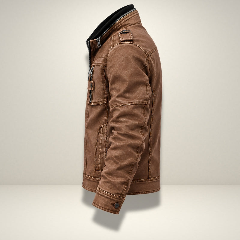 A brown canvas utility jacket with a black collar, shown in a side profile view against a light beige studio background.