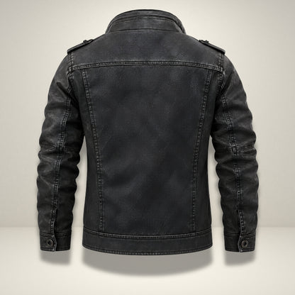 A black distressed leather jacket shown from the back, featuring a high collar, shoulder epaulets, and long sleeves, displayed against a neutral light gray background.