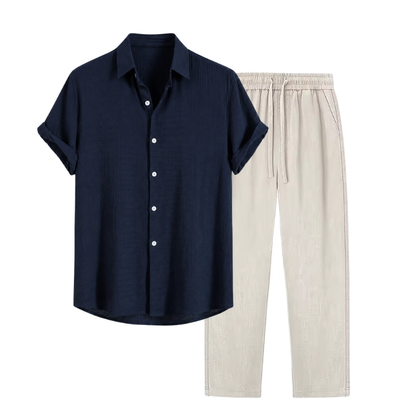 Navy shirt and beige pants on a white background