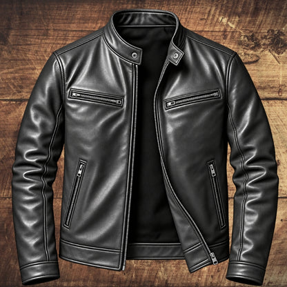 A black leather motorcycle jacket with a stand collar, front zipper, and zippered chest pockets, displayed on a rustic wooden plank background.