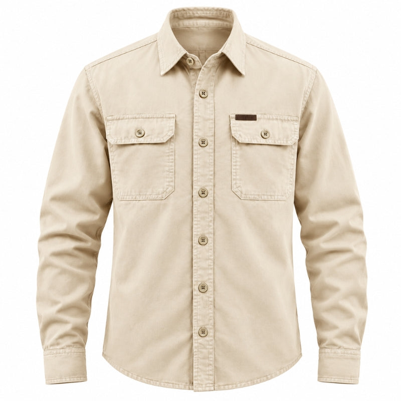 A beige long-sleeve button-up shirt with two buttoned chest pockets, shown on a plain white background.