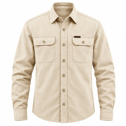 A beige long-sleeve button-up shirt with two buttoned chest pockets, shown on a plain white background.