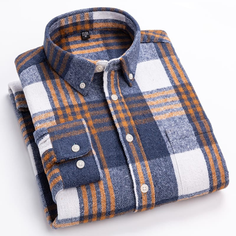 Folded plaid shirt with blue, orange, and white pattern on a white background