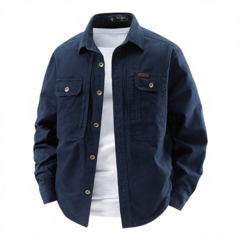 Navy blue jacket with white shirt underneath on a white background