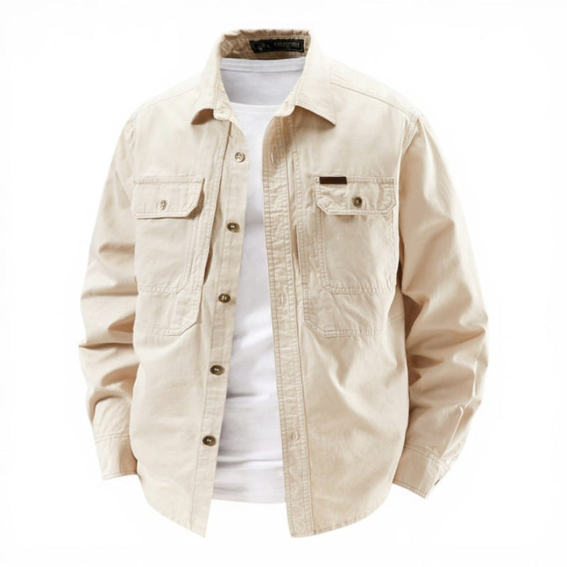 Beige jacket over a white shirt on a white background