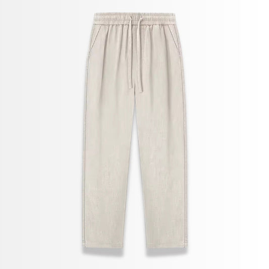 Beige linen pants on a white background