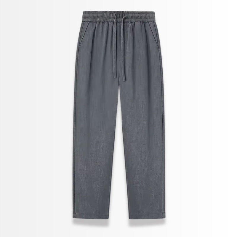 Gray linen pants with drawstring on a white background