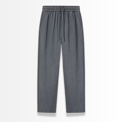 Gray linen pants with drawstring on a white background