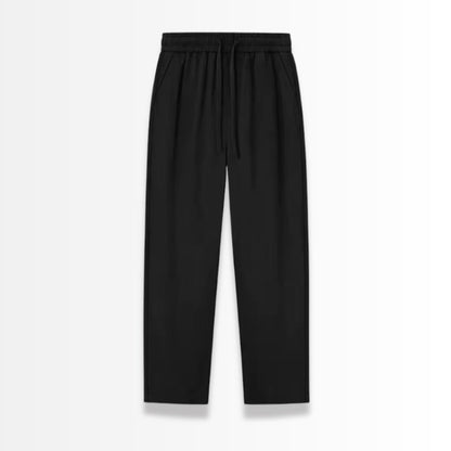 Black linen pants on a white background