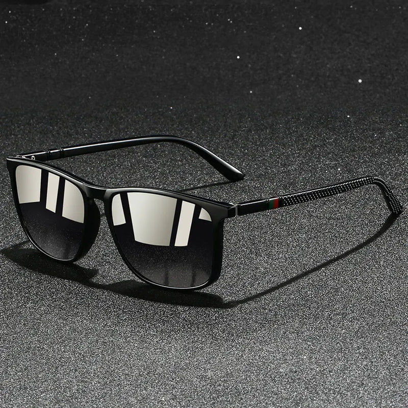 Black sunglasses with reflective lenses on a dark textured background