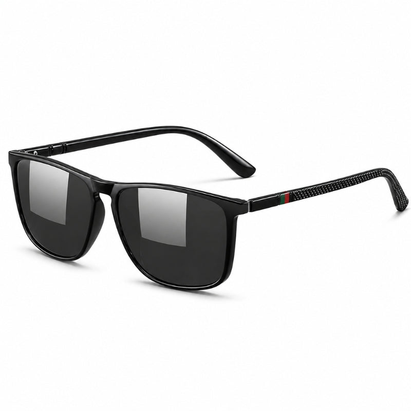 Black sunglasses with a brand logo on the arm against a white background