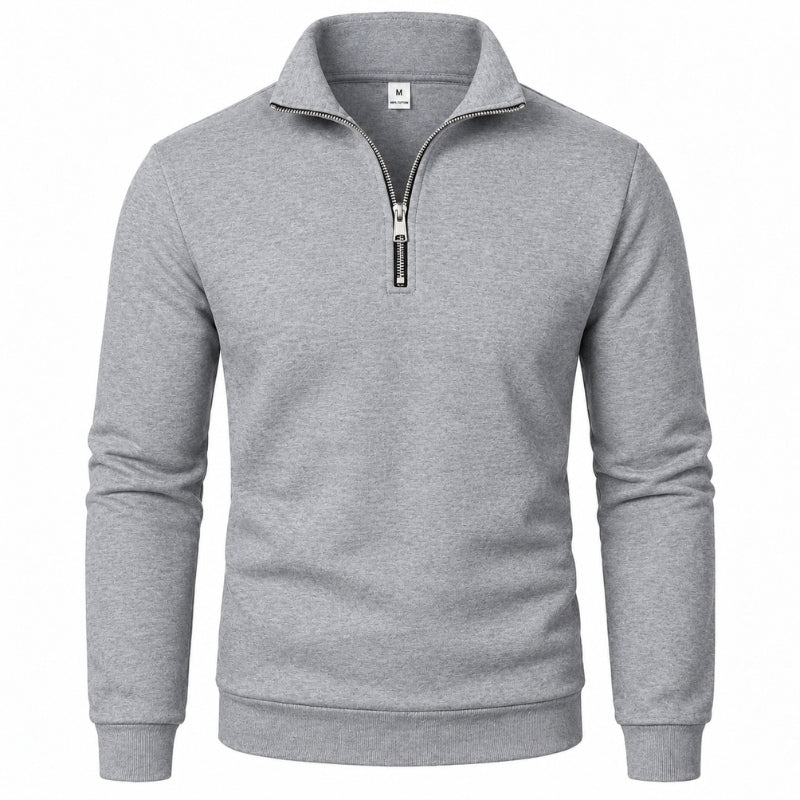 A light gray heathered quarter-zip sweatshirt with a stand-up collar and ribbed cuffs and hem, shown on a plain white background.