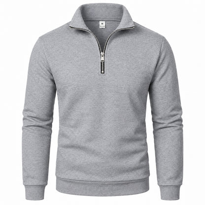 A light gray heathered quarter-zip sweatshirt with a stand-up collar and ribbed cuffs and hem, shown on a plain white background.