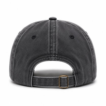 Black denim cap with a brown leather strap on a white background