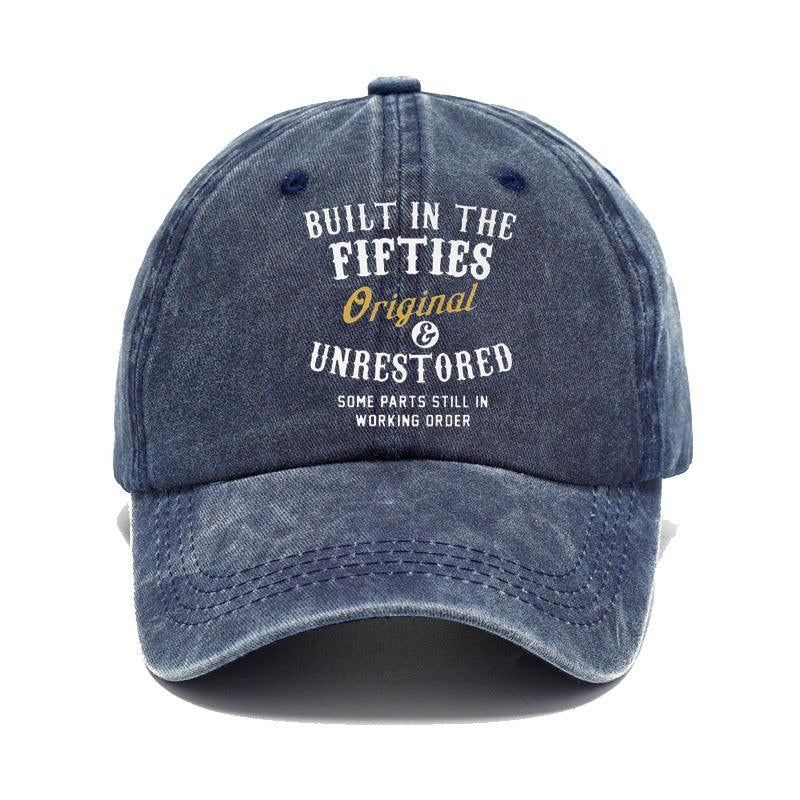 Blue denim cap with text on a white background