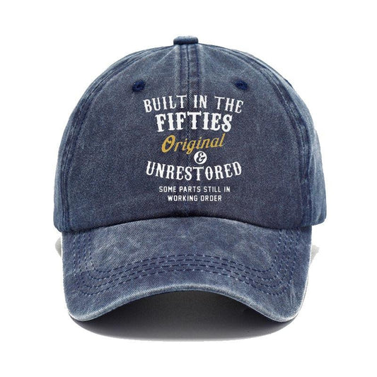 Blue denim cap with text on a white background