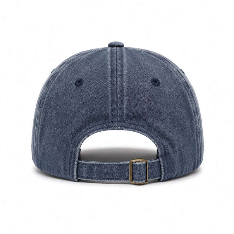 Blue denim cap with a brown buckle on a white background