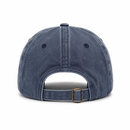 Blue denim cap with a brown buckle on a white background