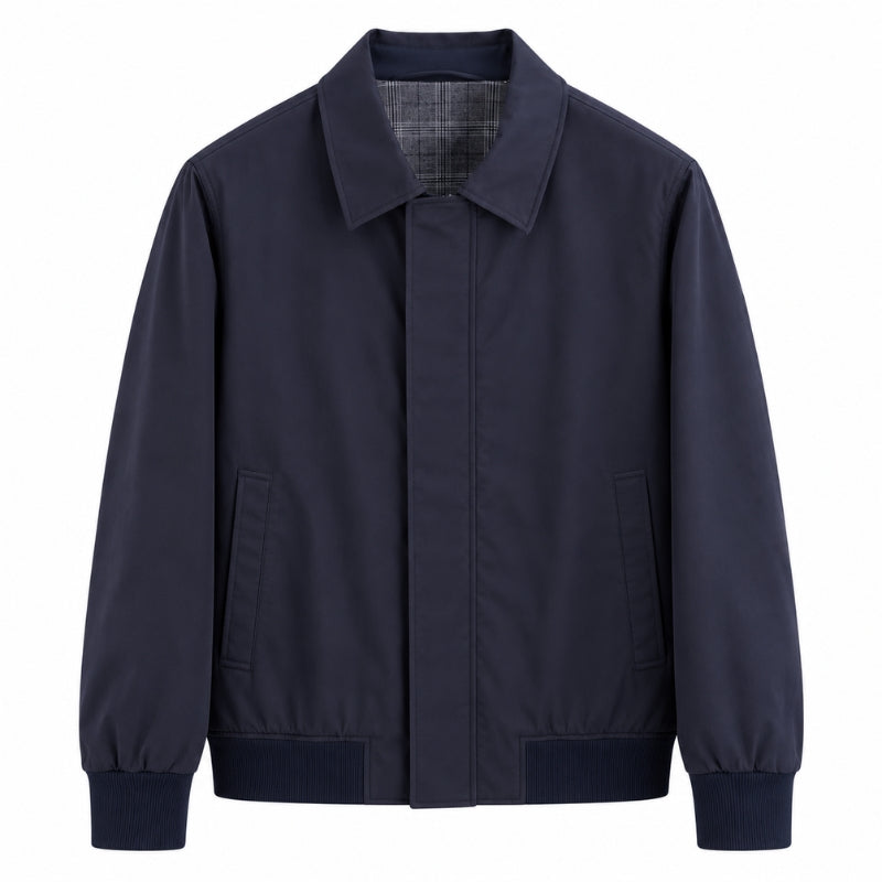 A dark navy blue utility jacket with a pointed collar, front zipper closure, and ribbed cuffs and hem, shown against a plain white background.