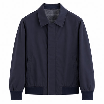 A dark navy blue utility jacket with a pointed collar, front zipper closure, and ribbed cuffs and hem, shown against a plain white background.