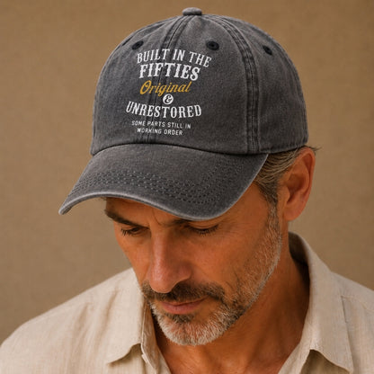 Man wearing a cap with text on a beige background