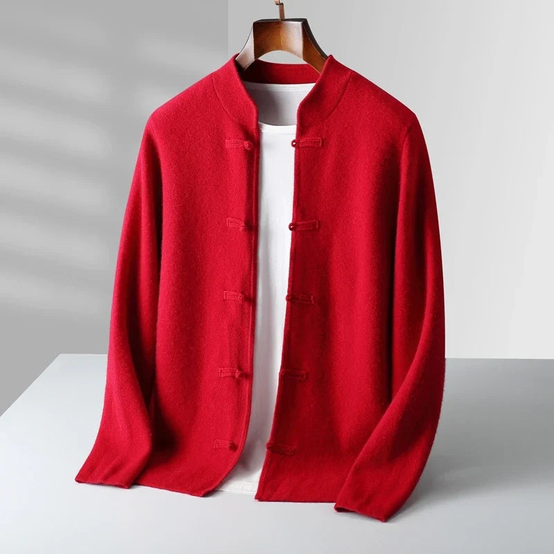 Red jacket on a hanger against a gray background