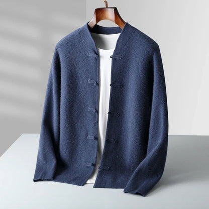 Blue cardigan on a mannequin against a gray background