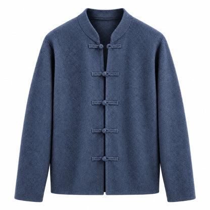 A men's long-sleeve traditional Chinese-style jacket in a textured slate blue fabric, featuring five dark blue fabric toggle closures on the front, set against a plain white background.