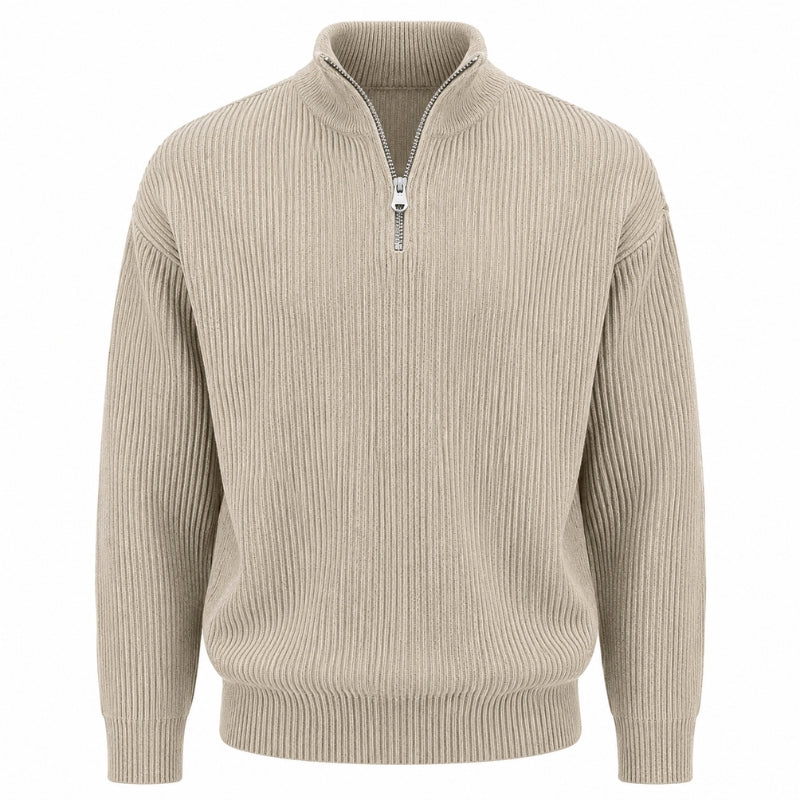 A beige ribbed knit quarter-zip sweater with a stand collar and a silver zipper, shown on a plain white background.