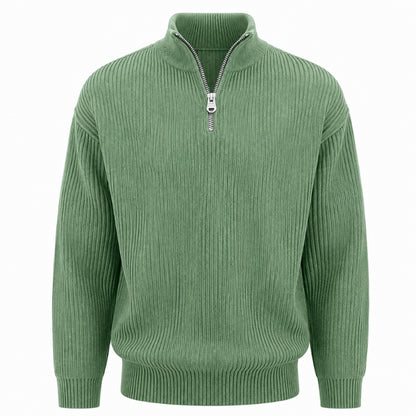 A sage green ribbed knit quarter-zip sweater with a stand collar and silver zipper, shown on a plain white background.