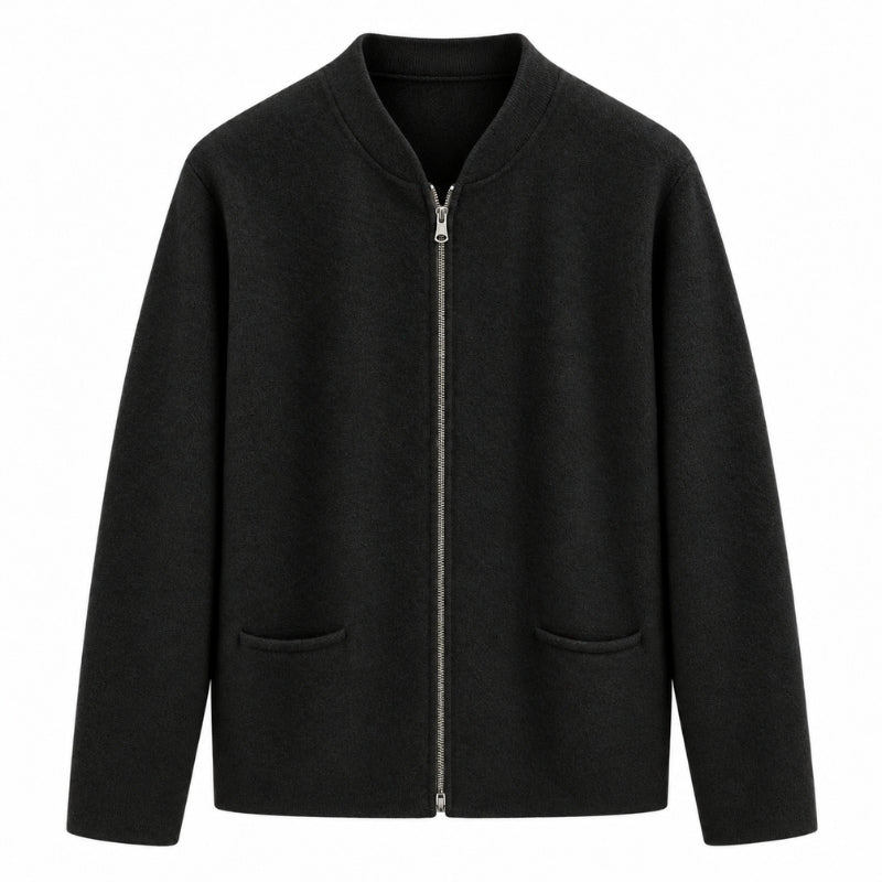 A black zip-up jacket with a stand collar, long sleeves, and two front patch pockets, shown against a plain white background.