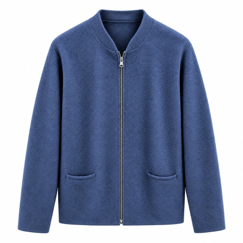 A blue zip-up jacket with a stand collar, long sleeves, and two front patch pockets, shown against a plain white background.