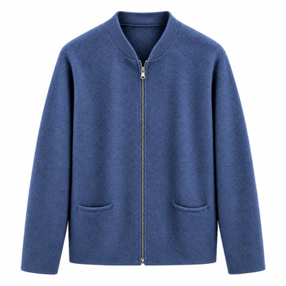 A blue zip-up jacket with a stand collar, long sleeves, and two front patch pockets, shown against a plain white background.