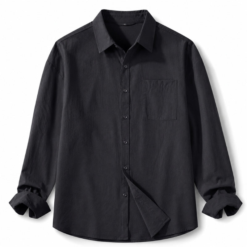 A black long-sleeve button-up shirt with a chest pocket, displayed on a clean white background.