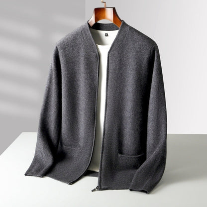 A dark gray open-front knit cardigan with a stand collar, long sleeves, and front patch pockets, displayed on a wooden hanger over a white shirt against a light gray background.