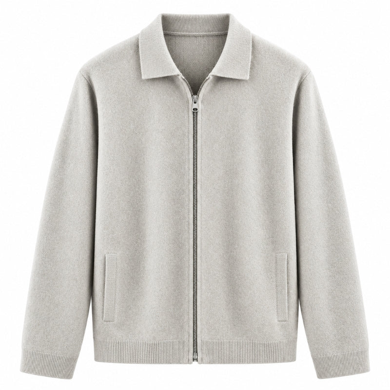 A light gray knit zip-up jacket with a pointed collar, ribbed cuffs and hem, and two front welt pockets, shown on a plain white background.