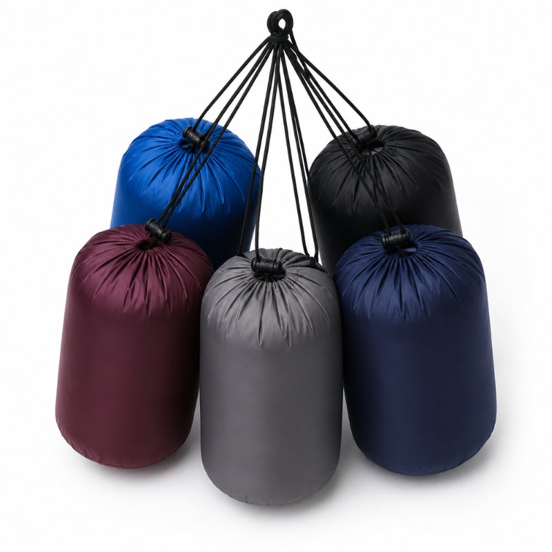 Five cylindrical drawstring storage bags in blue, black, burgundy, gray, and navy, arranged in a cluster on a white background.